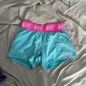 Pink and blue Nike spandex